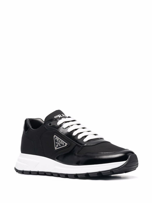 Re-Nylon Triangle-logo low-top sneakers