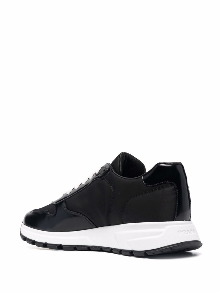 Re-Nylon Triangle-logo low-top sneakers