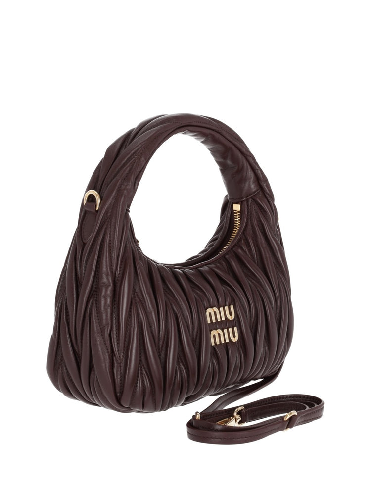 Wander matelassé mini bag