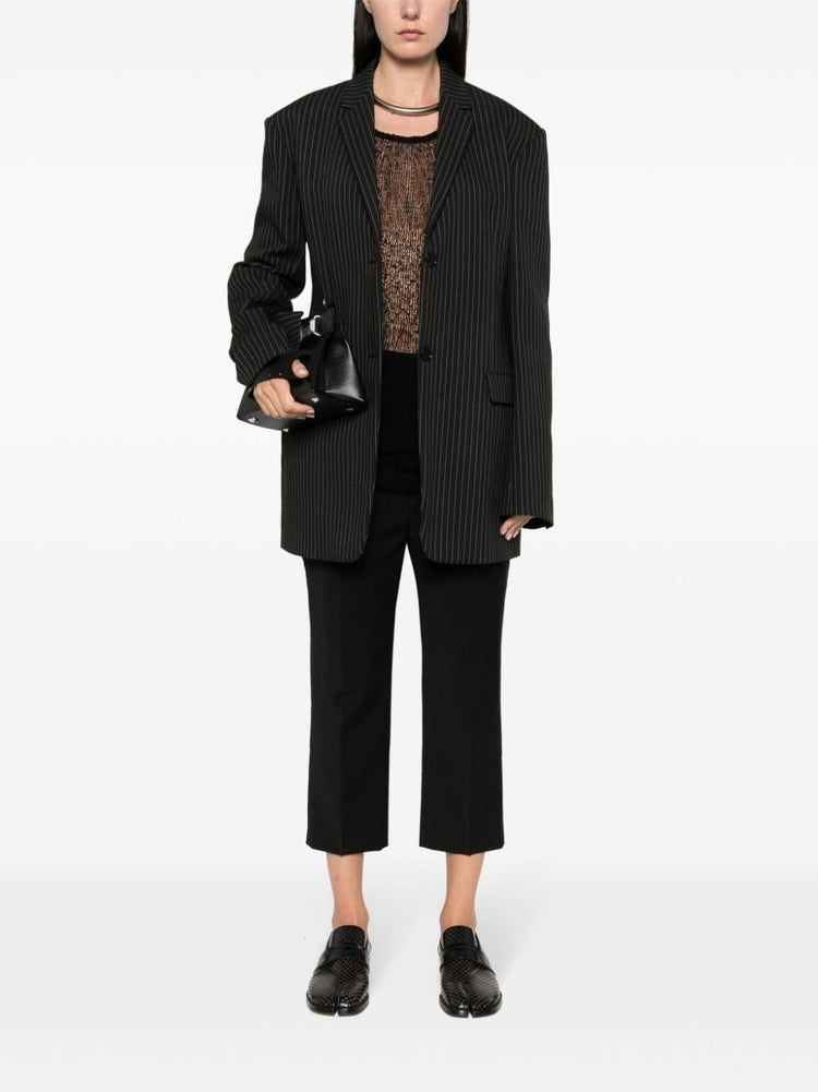 pressed-creased wool trousers