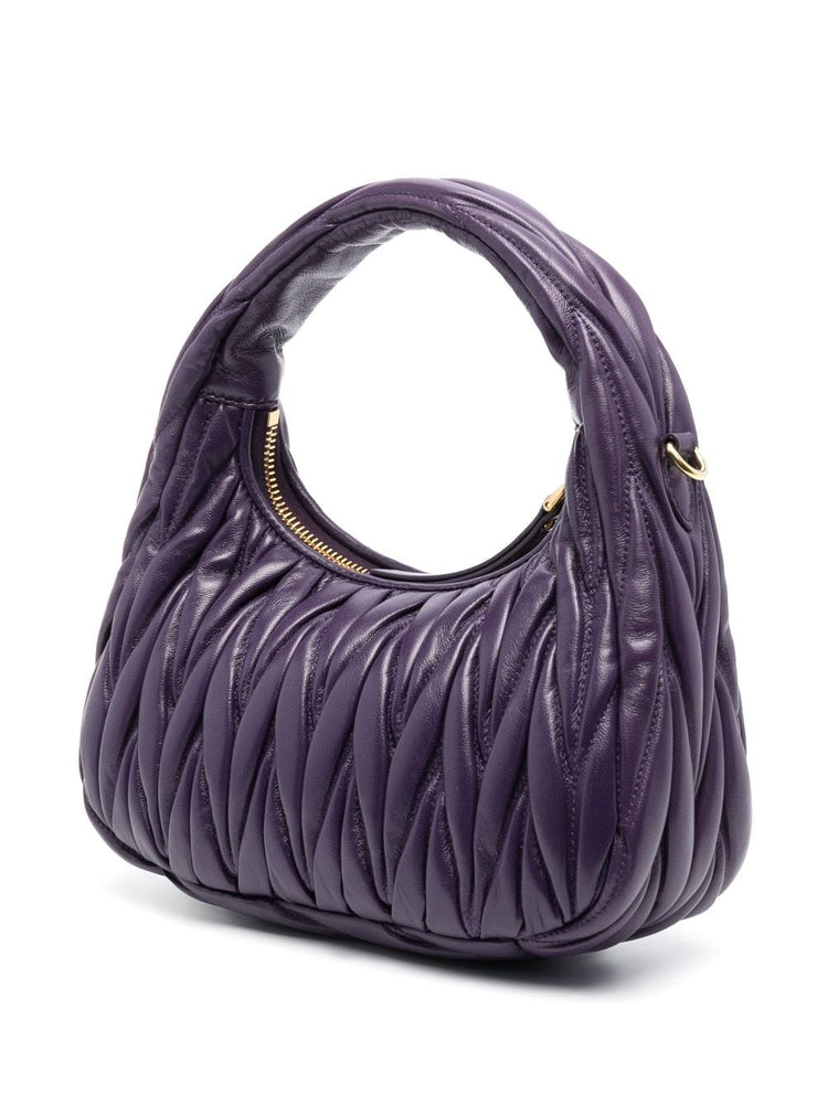Wander matelassé mini bag
