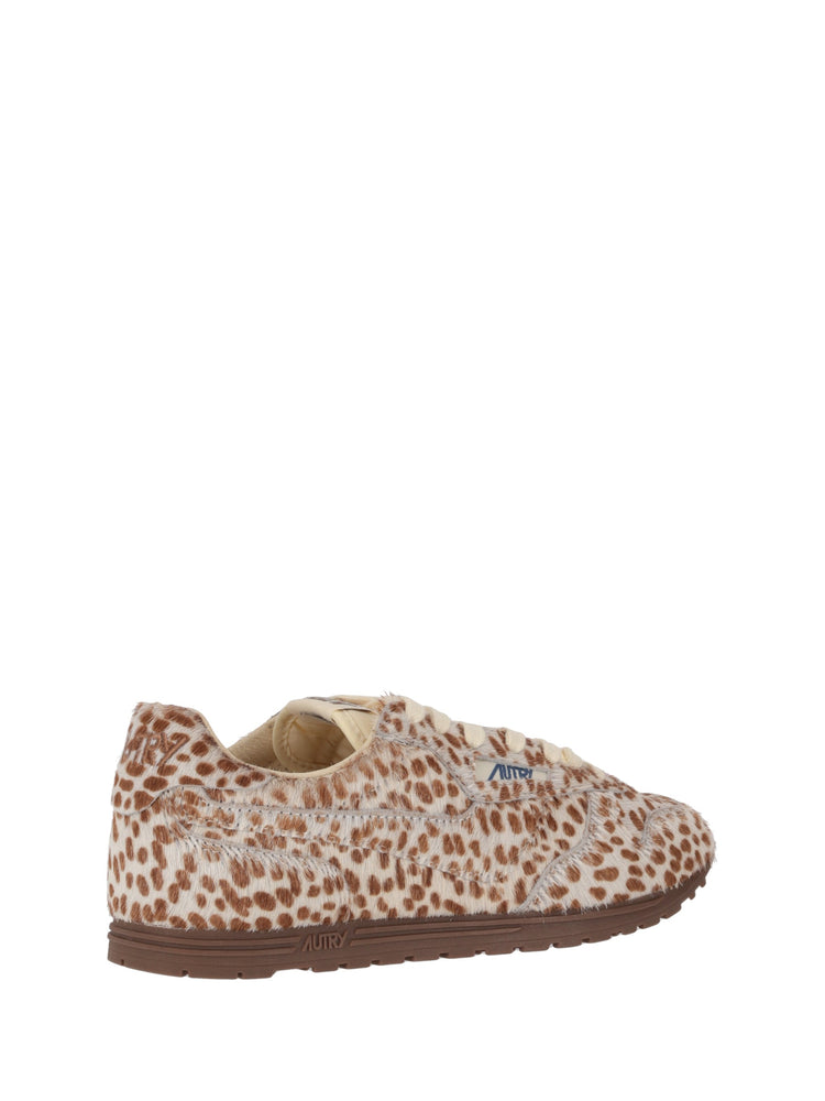 WINDSPIN LOW WOM PONY/NYLON