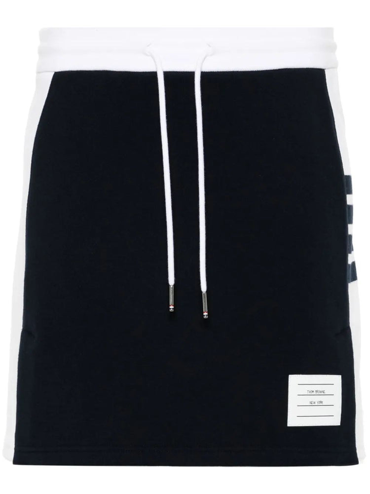 MINI SKIRT W/ ENGINEERED 4 BAR IN BLOCKED CLASSIC SOLID CLASSIC LOOPBACK JERSEY