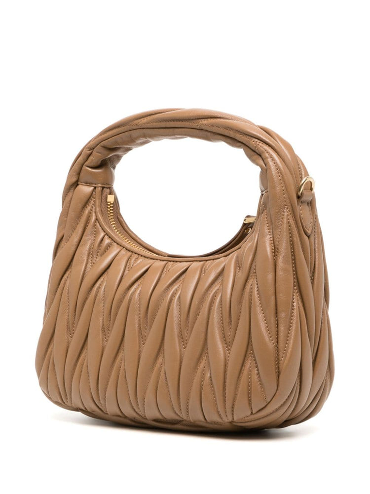 Wander matelassé mini bag