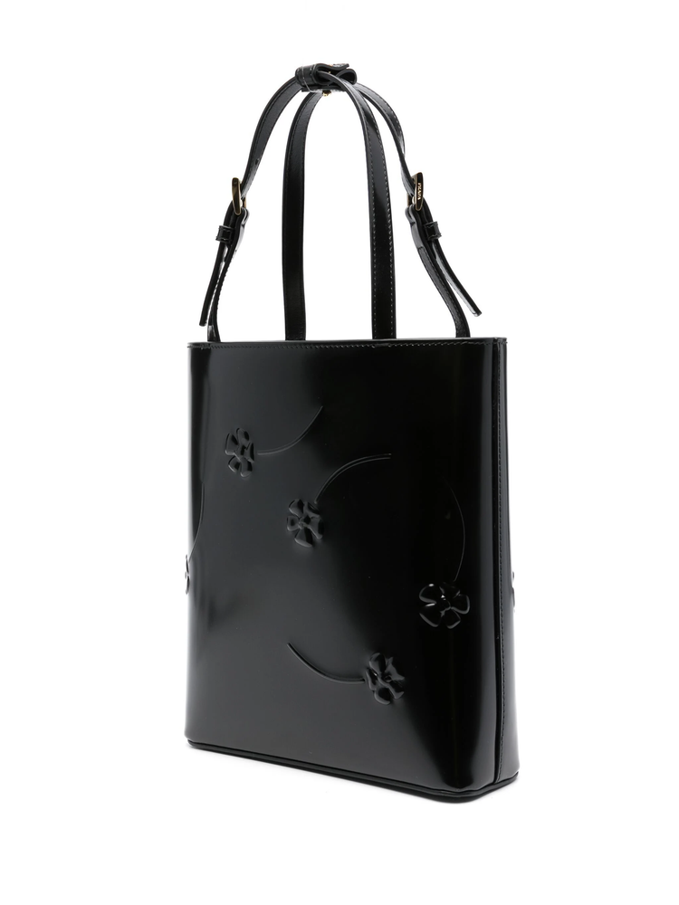floral-embossed leather tote bag