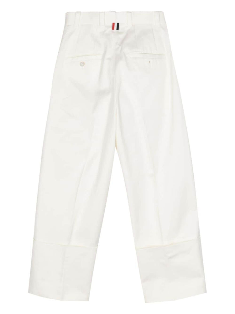 pressed-crease tapered trousers