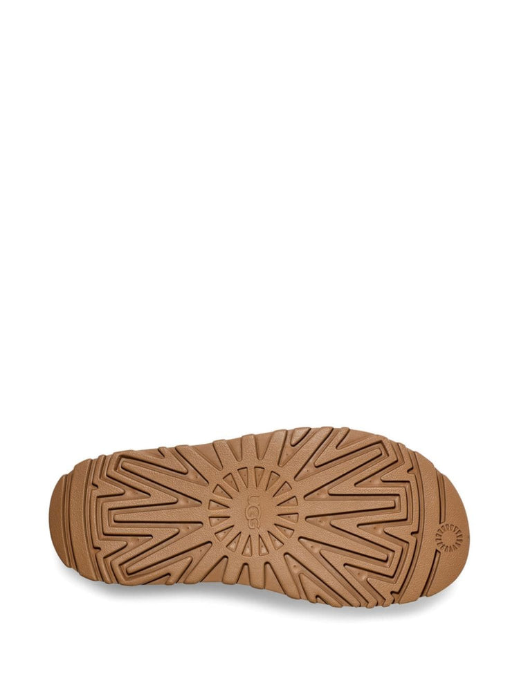 GoldenGlow logo-embossed sandals