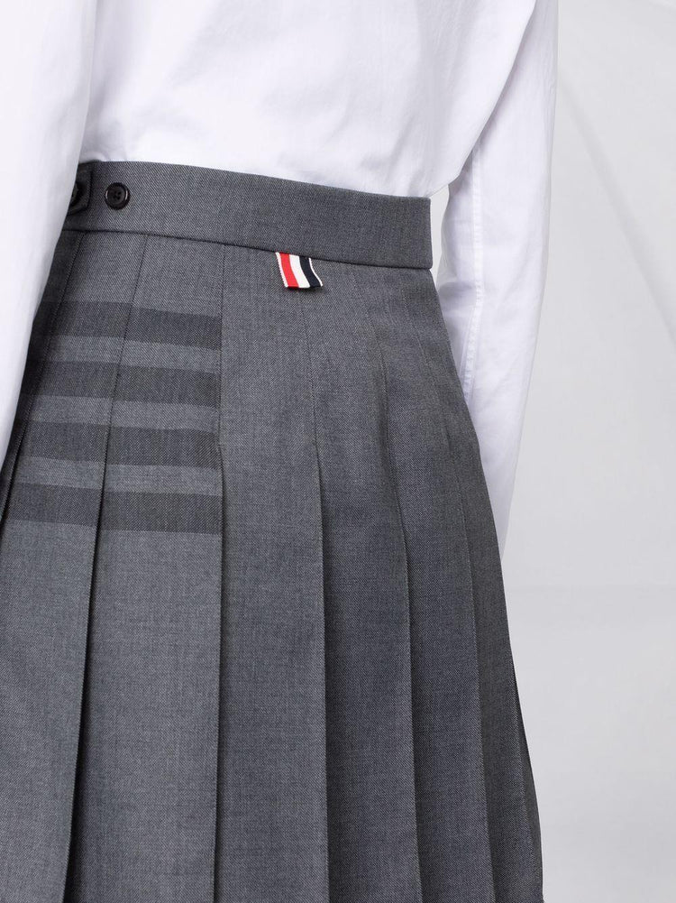 THIGH LENGTH DROPPED BACK PLEATED SKIRT W/ TONAL WOVEN 4 BAR IN STEP TWILL SCHOOL UNIFORM