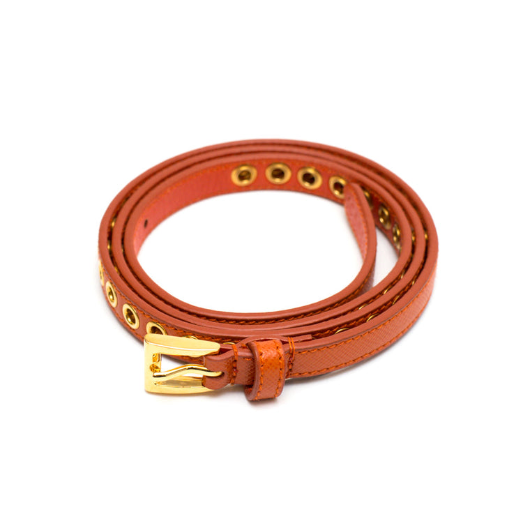 PRADA skinny eyelet belt orange
