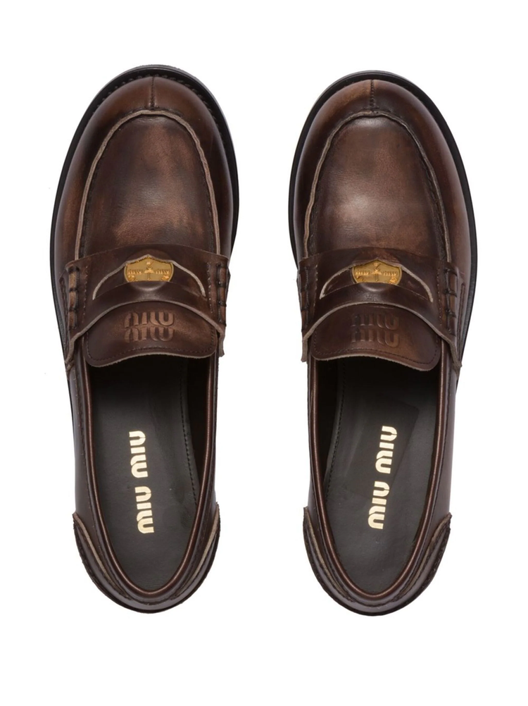 logo-embossed leather penny loafers