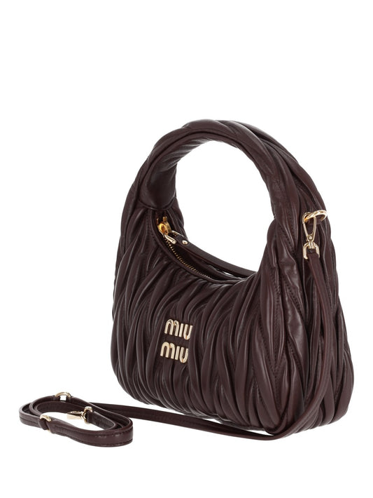 Wander matelassé mini bag