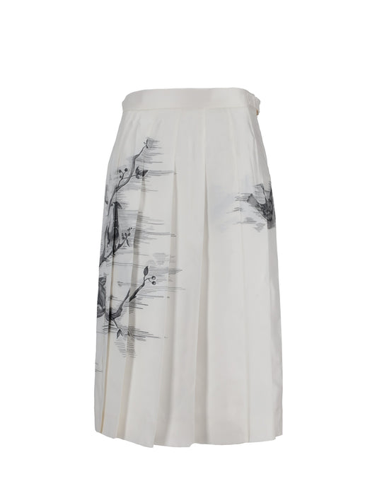 CLASSIC KNEE DROPPED BACK PLEATED SKIRT IN ENGINEERED BIRD TOILE  PRINTED SILK TWILL