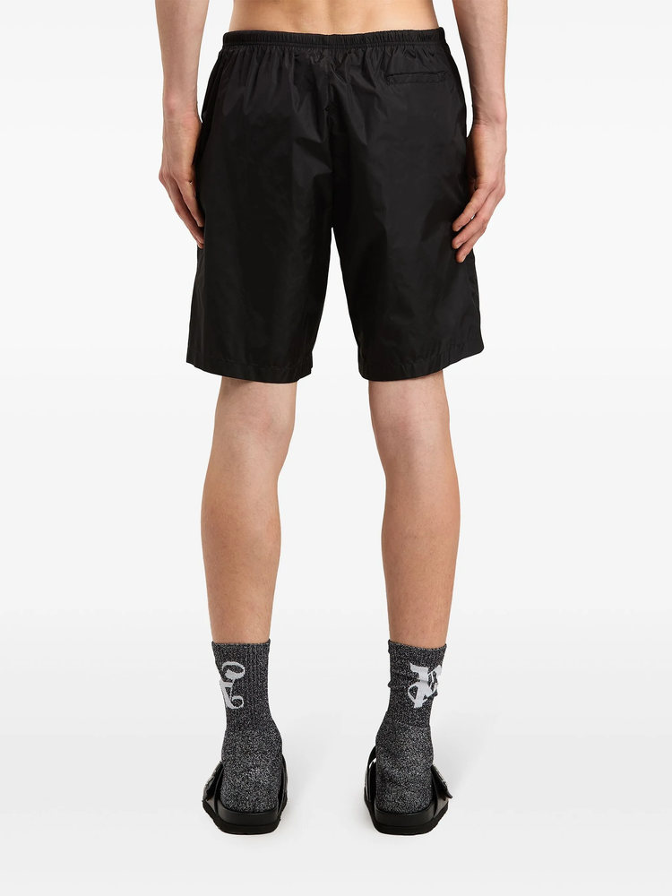 curved-logo swim shorts