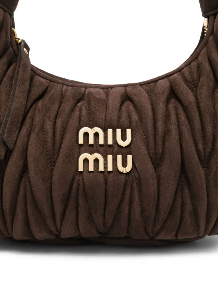 Wander matelassé suede hobo bag