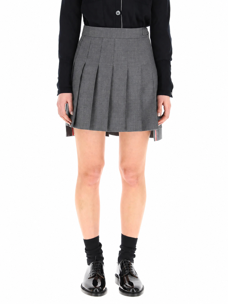 THIGH LENGTH DROPPED BACK PLEATED SKIRT IN SUPER 120’S TWILL