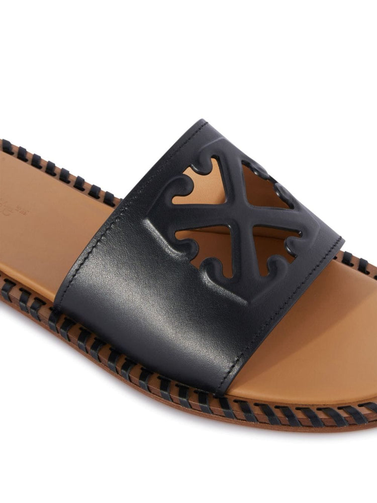 Twist Arrow-embossed leather slides