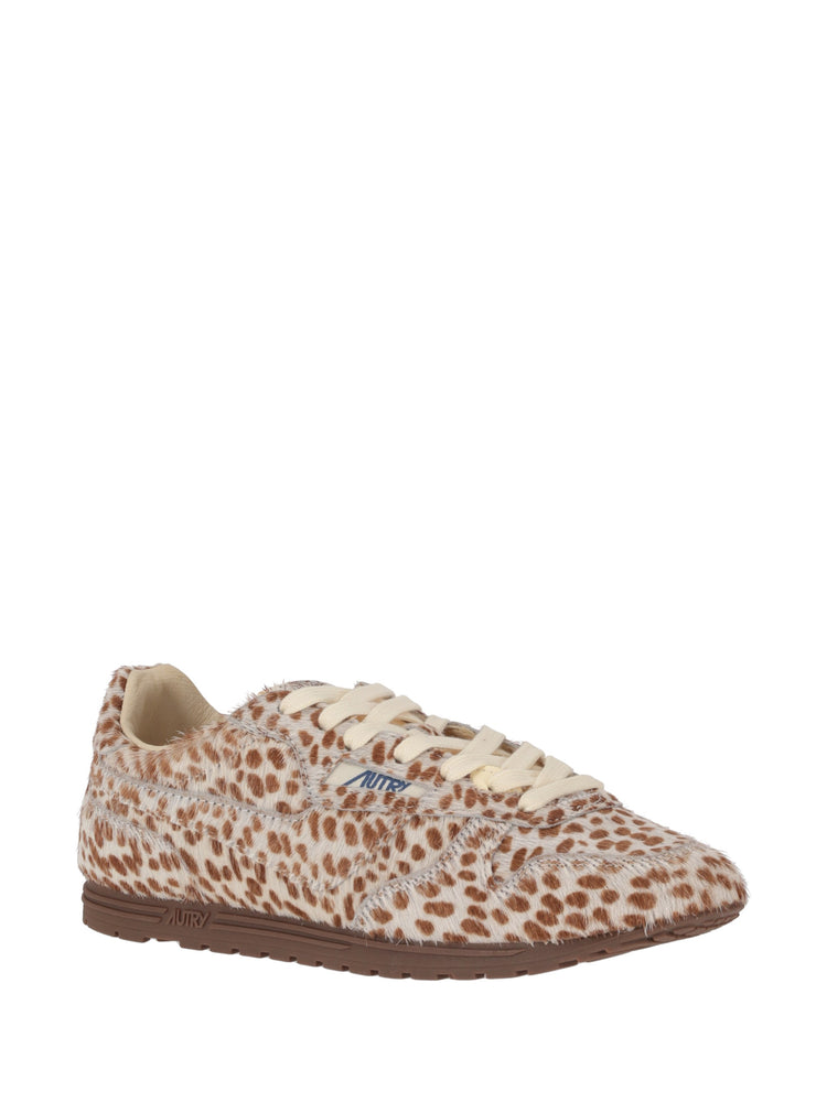 WINDSPIN LOW WOM PONY/NYLON