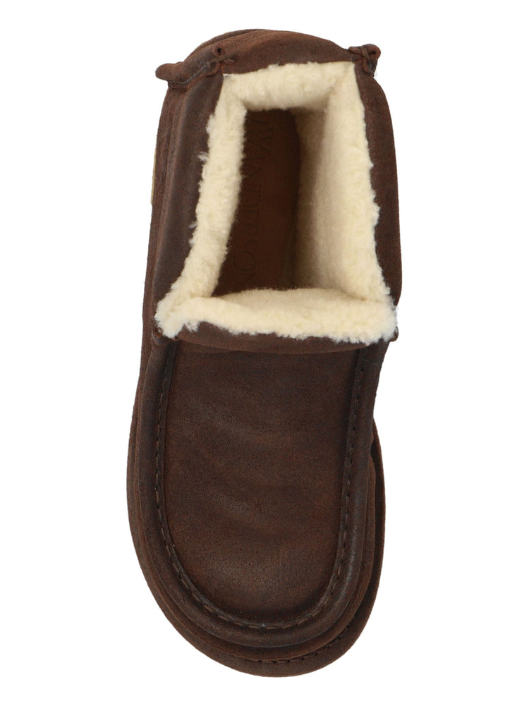 shearling-lined suede boots