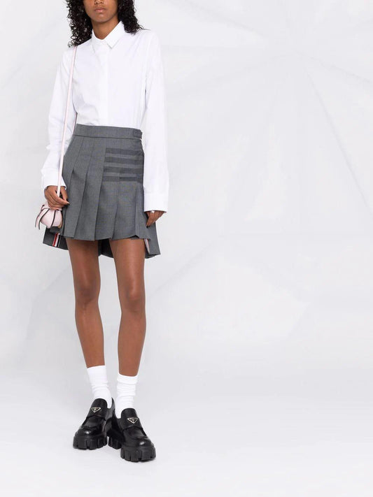 THIGH LENGTH DROPPED BACK PLEATED SKIRT W/ TONAL WOVEN 4 BAR IN STEP TWILL SCHOOL UNIFORM