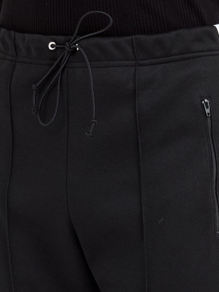 four-stitch logo track pants