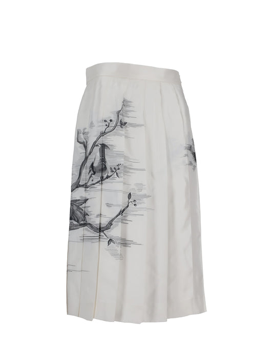 CLASSIC KNEE DROPPED BACK PLEATED SKIRT IN ENGINEERED BIRD TOILE  PRINTED SILK TWILL