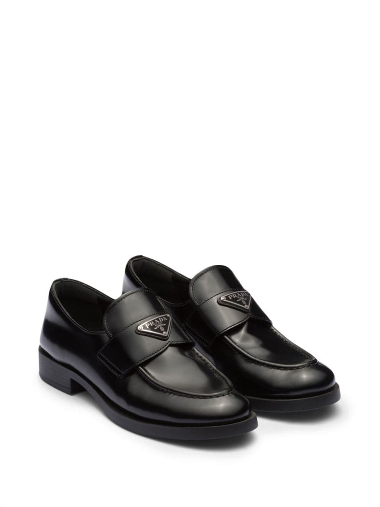 triangle-logo leather loafers