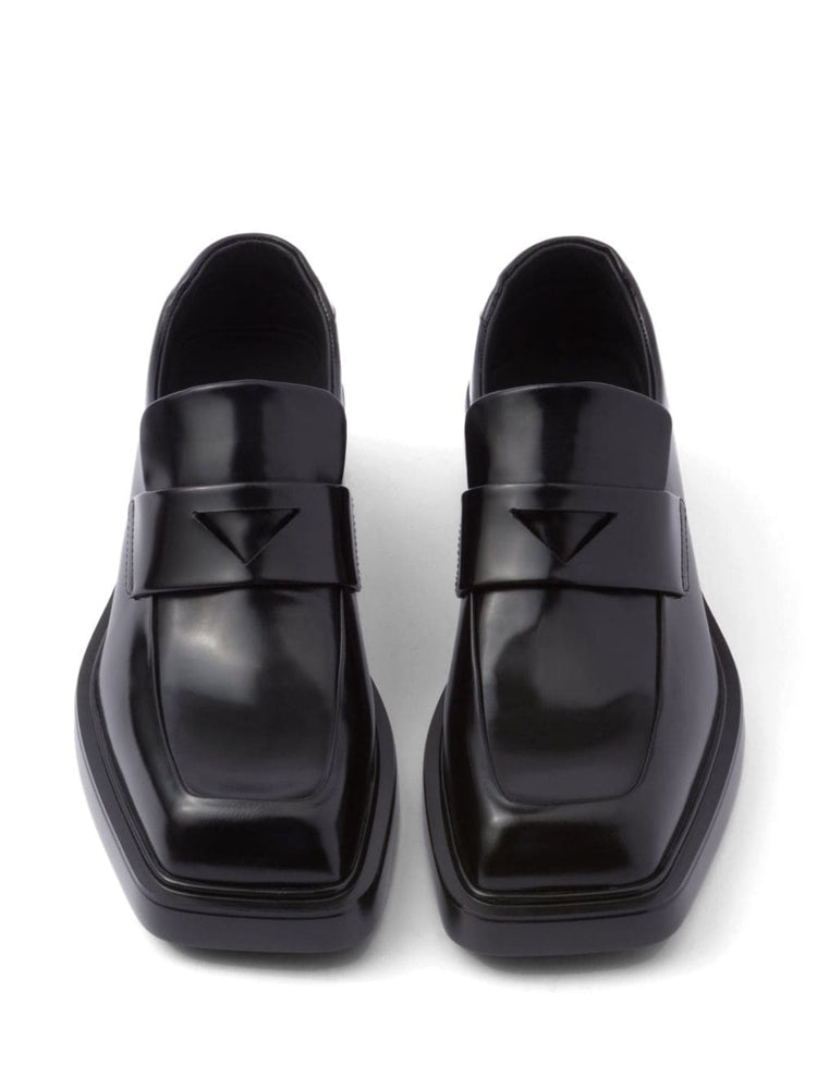 triangle-patch leather loafers
