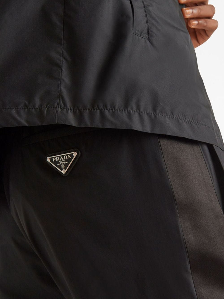 triangle-logo silk track pants